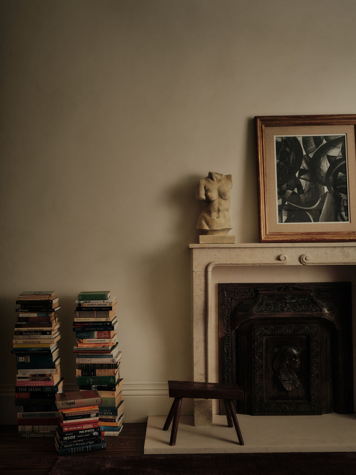 Brooklyn Townhouse fireplace with book stacks, Montana Labelle Design